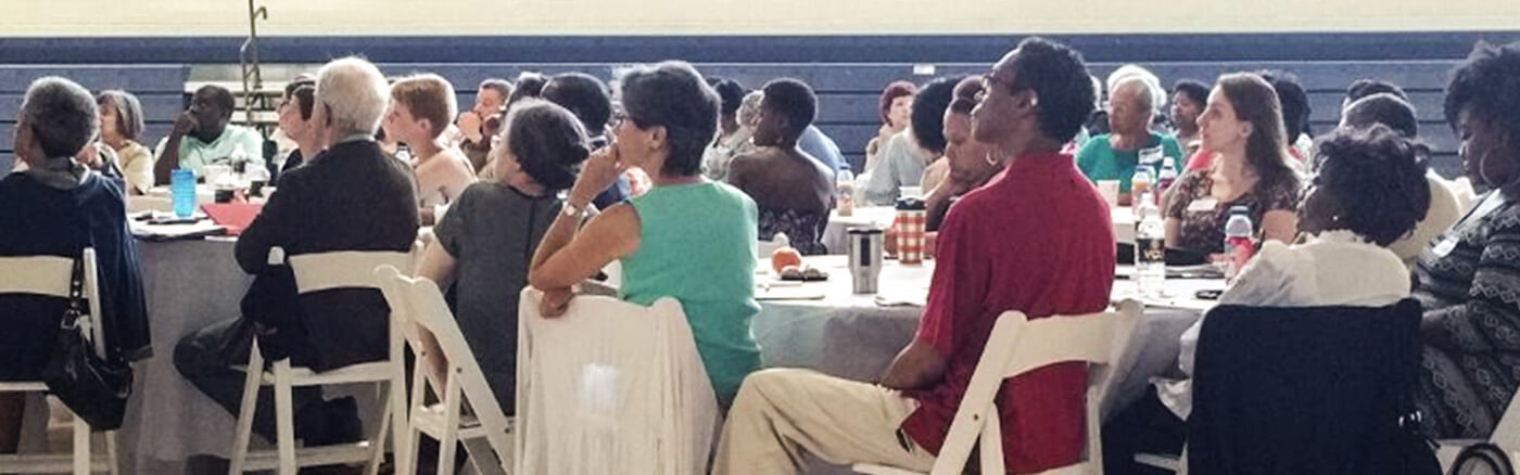 community consultation participants sitting at tables